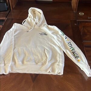 The North Face Cream Hoodie with Floral Sleeve